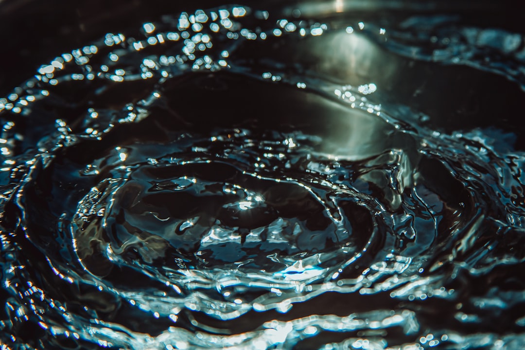 water drops on blue water