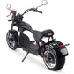 A black electric scooter with a powerful hub motor and a large lithium battery. The scooter has front and rear LED lights, a speedometer, and front and rear blinkers. It also has hydraulic brakes and large tires.